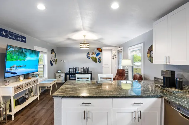 a bed room with a bed and a window