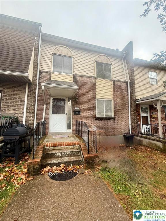 630 Greene Court Fountain Hill, PA 18015 - Photo 1 of 13 a front view of a house with a garage