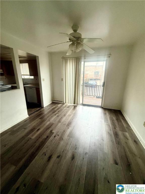 630 Greene Court Fountain Hill, PA 18015 - Photo 4 of 13 a view of a livingroom with wooden floor and a ceiling fan