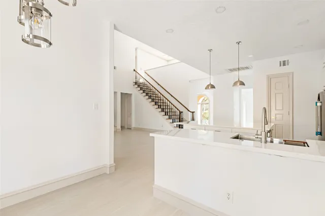 a bathroom with a sink and mirror