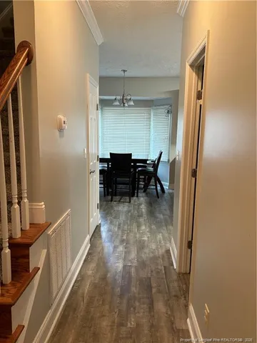 a view of a living room with furniture