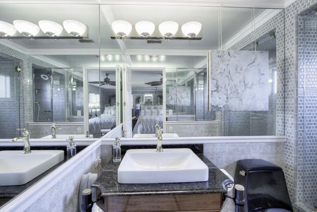 a large kitchen with a table and chairs