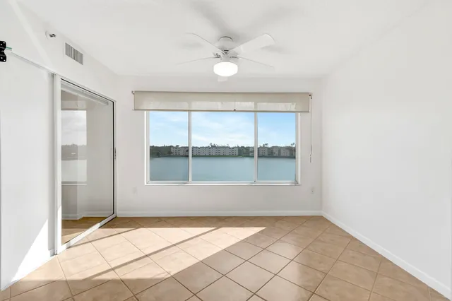 a view of a lake with a city view