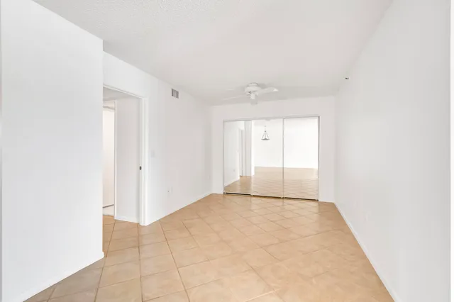 a kitchen with stainless steel appliances granite countertop a sink and a stove