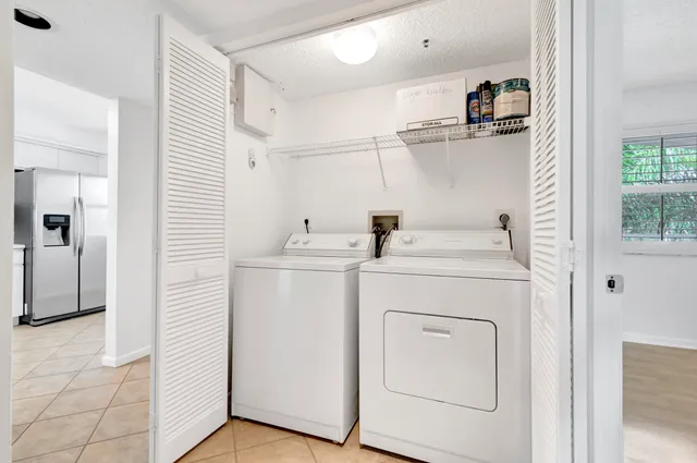 a view of an outdoor space and tennis court