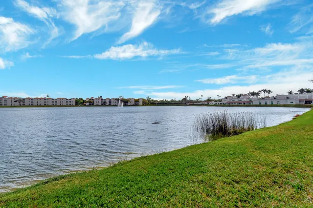 a living room with gym equipment and a large window