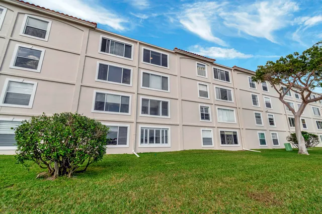 a kitchen with a table and chairs in it