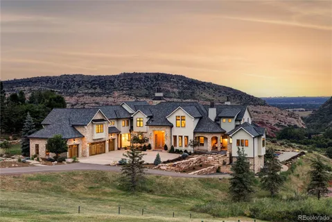 an aerial view of residential houses and ocean view