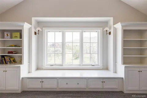 a view of a sink and a window