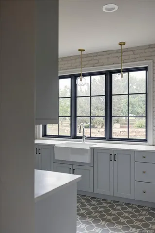 a view of a kitchen and a sink