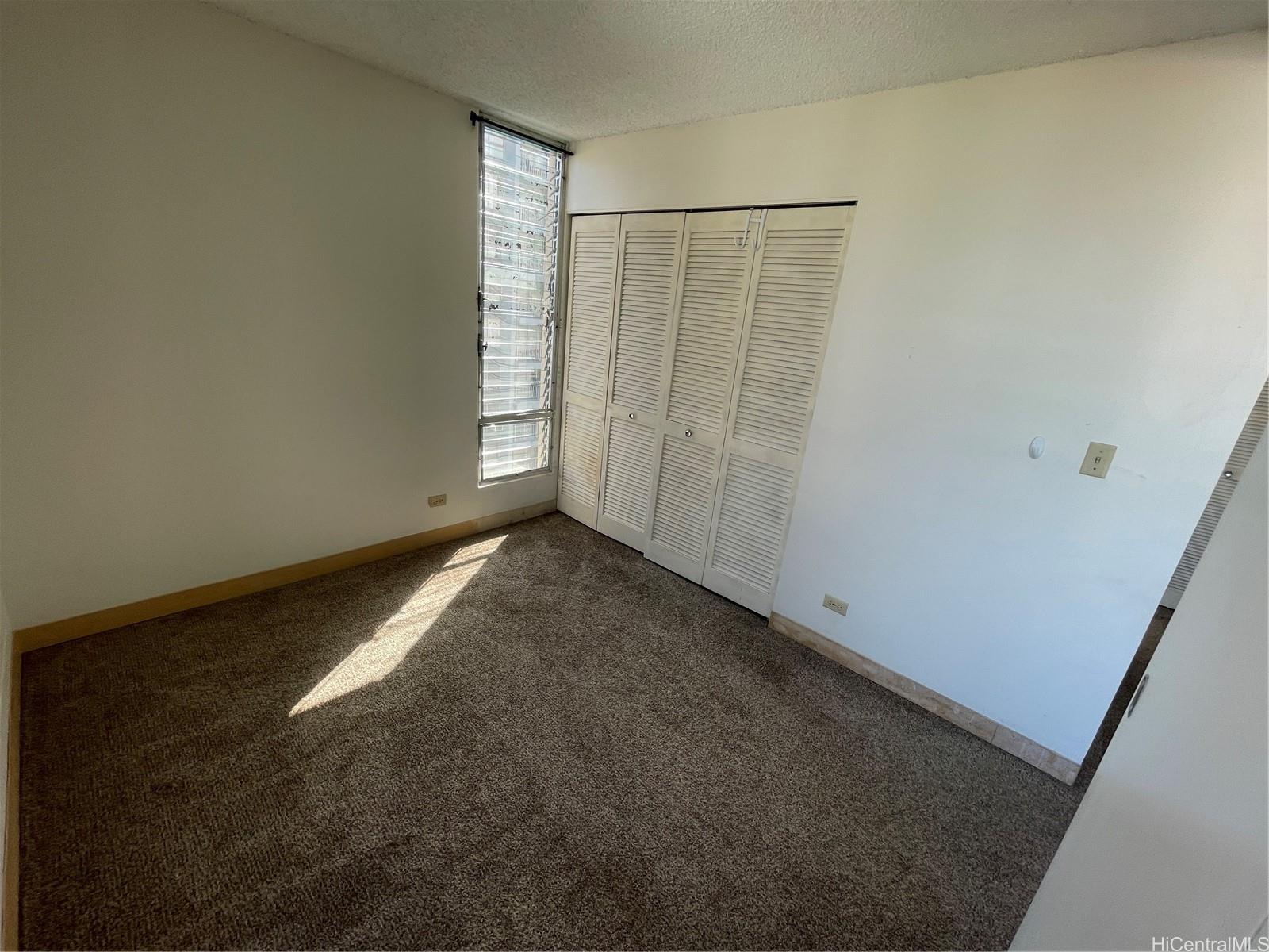 1624 Dole Street, Unit 804 Honolulu, HI 96822 - Photo 5 of 8 a view of an empty room