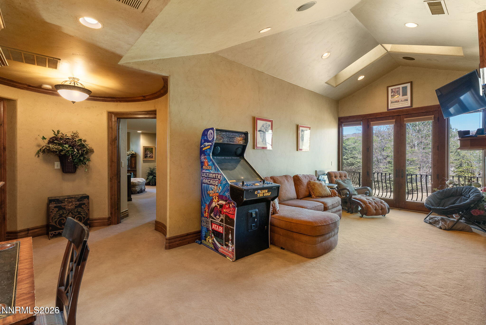123 Andrew Lane Reno, NV 89521 - Photo 28 of 50 a living room with furniture gym equipment and a large window