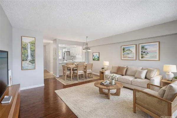a living room with furniture and a table