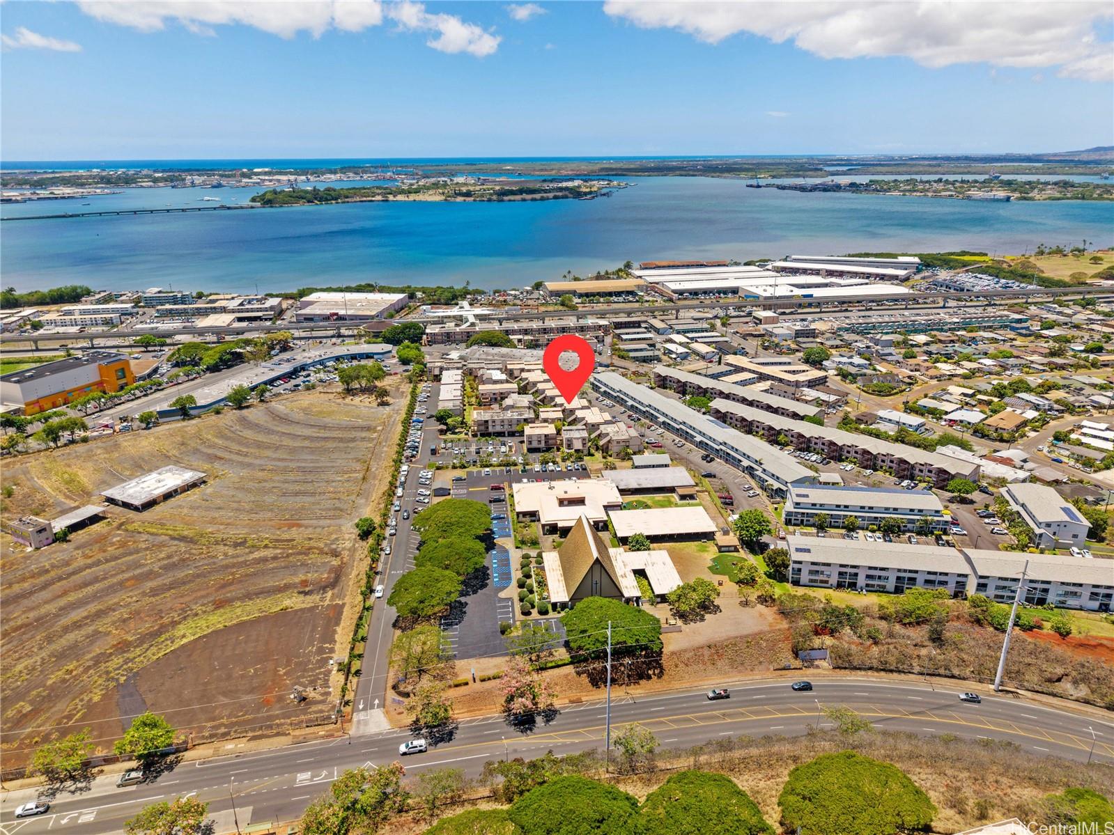 98-941 Moanalua Road, Unit 403 Aiea, HI 96701 - Photo 15 of 19 a view of an ocean and beach
