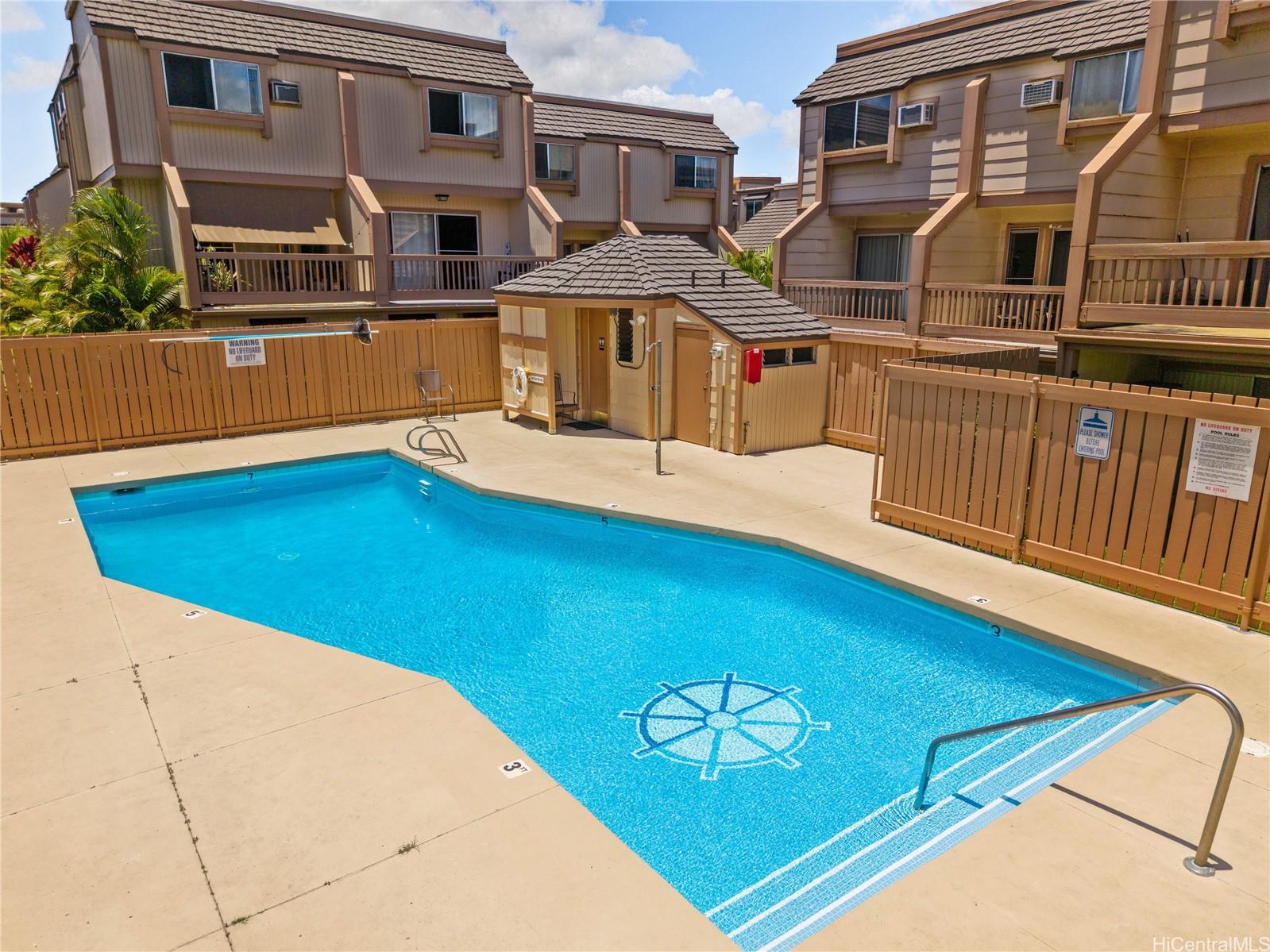 98-941 Moanalua Road, Unit 403 Aiea, HI 96701 - Photo 18 of 19 a view of pool with outdoor seating