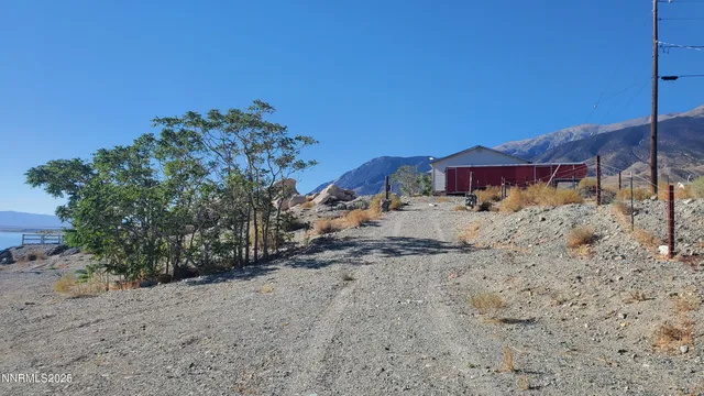 a view of a yard with a house