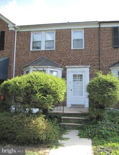 6431 Blenheim Road Baltimore, MD 21212 - Photo 1 of 12 a view of front of a house with a yard