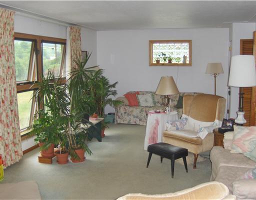 1303 Cross Creek Road Burgettstown, PA 15021 - Photo 2 of 10 Living Room. Living room with large window for plenty of natural light.