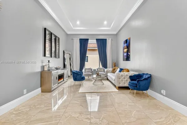 a living room with furniture and window