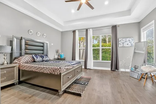 a bedroom with a bed and a table in it