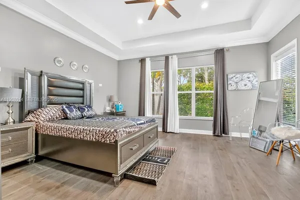 a bedroom with a bed and a table in it