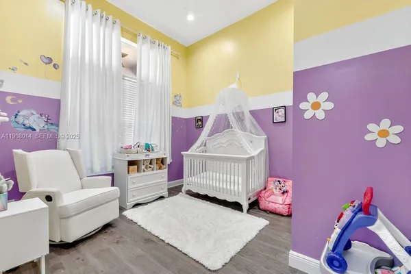 a bedroom with furniture and a couch