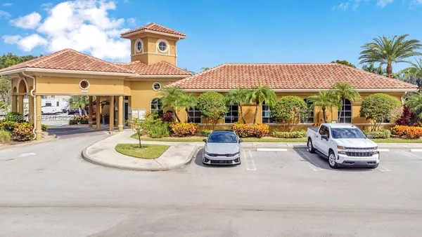 a car parked in front of a house