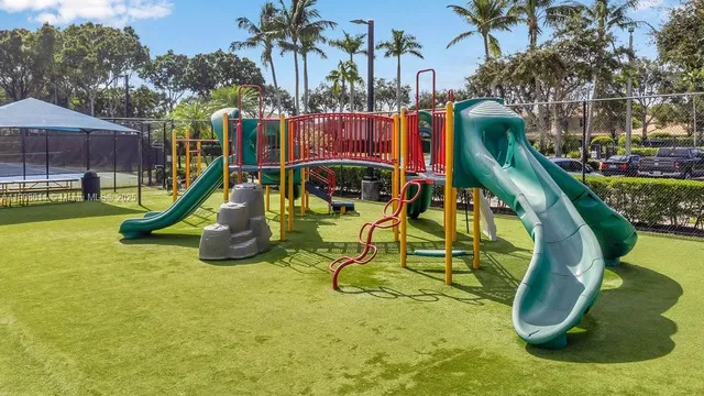 a view of a park with a slide