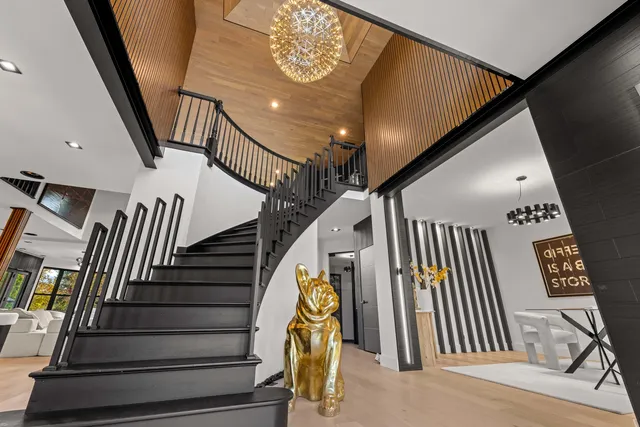 a room with gym equipment and large window