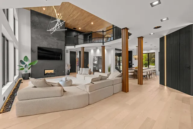 a white bath tub sitting in a bathroom next to a window