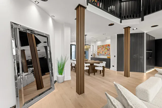 a view of a balcony with wooden floor