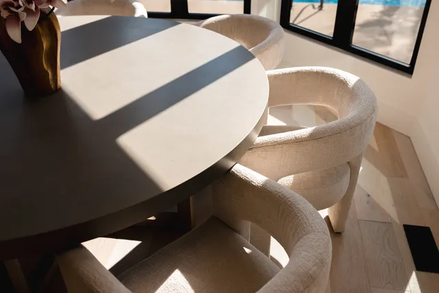 a view of a wooden fence and a yard