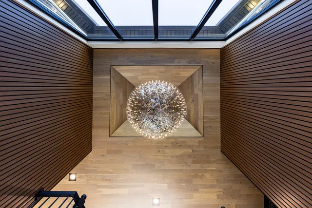 a living room with furniture and window