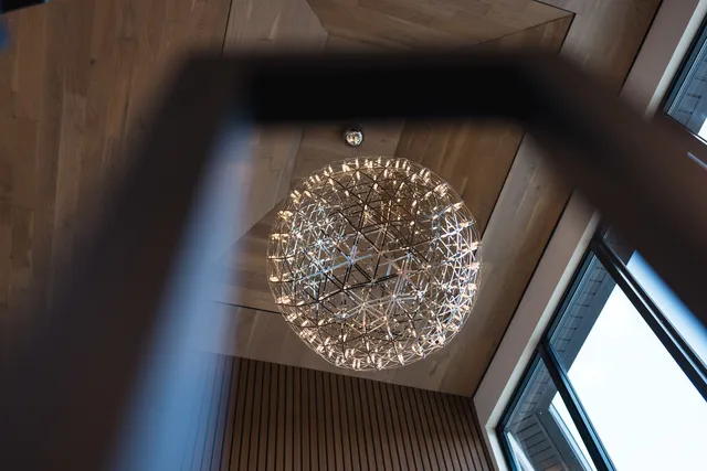 a living room with furniture a window and a table