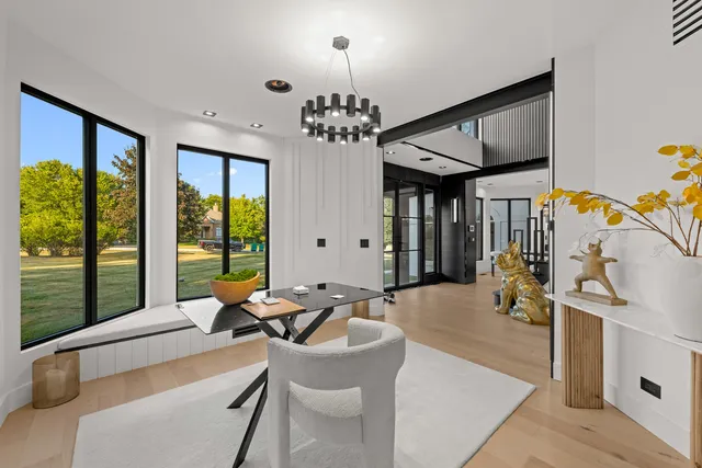 a vase of flowers sitting on a table