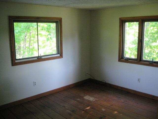 194 Weeks Mills Road South China, ME 04358 - Photo 21 of 27 3rd Bedroom with wood floor