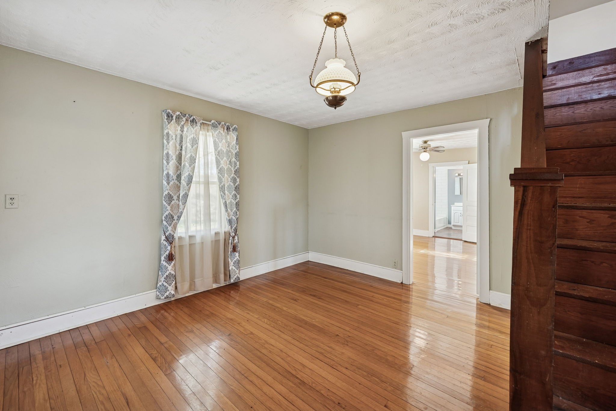2554 Bakerton Road Red Boiling Springs, TN 37150 - Photo 12 of 46 a view of empty room with wooden floor and window