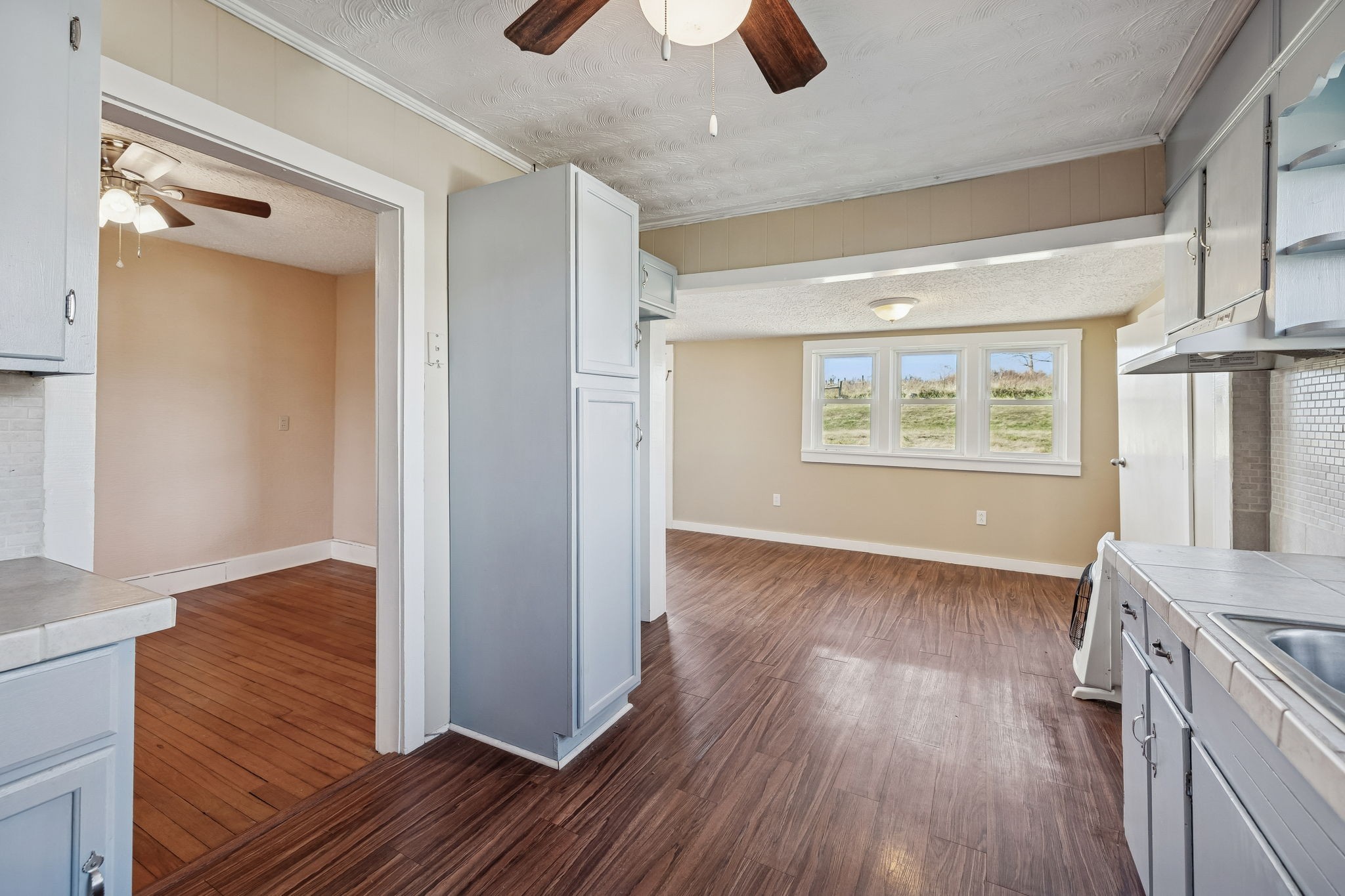 2554 Bakerton Road Red Boiling Springs, TN 37150 - Photo 24 of 46 wooden floor in an empty room with a window