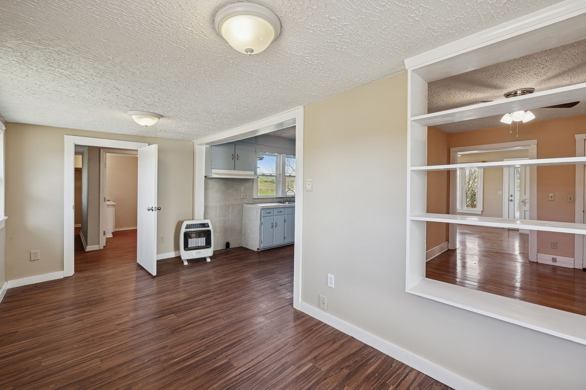 2554 Bakerton Road Red Boiling Springs, TN 37150 - Photo 27 of 46 a view of a room with wooden floor and window
