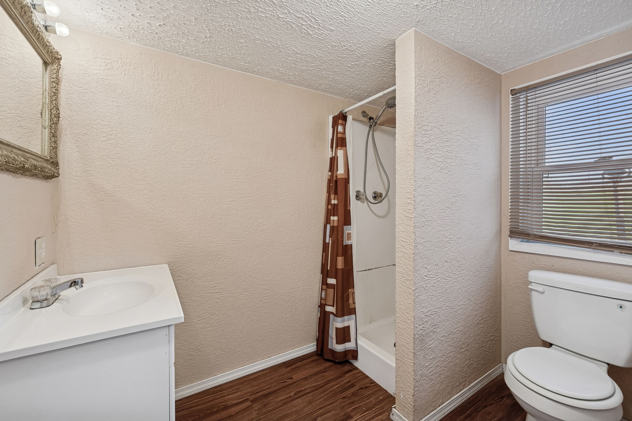 2554 Bakerton Road Red Boiling Springs, TN 37150 - Photo 29 of 46 a bathroom with a toilet and a sink