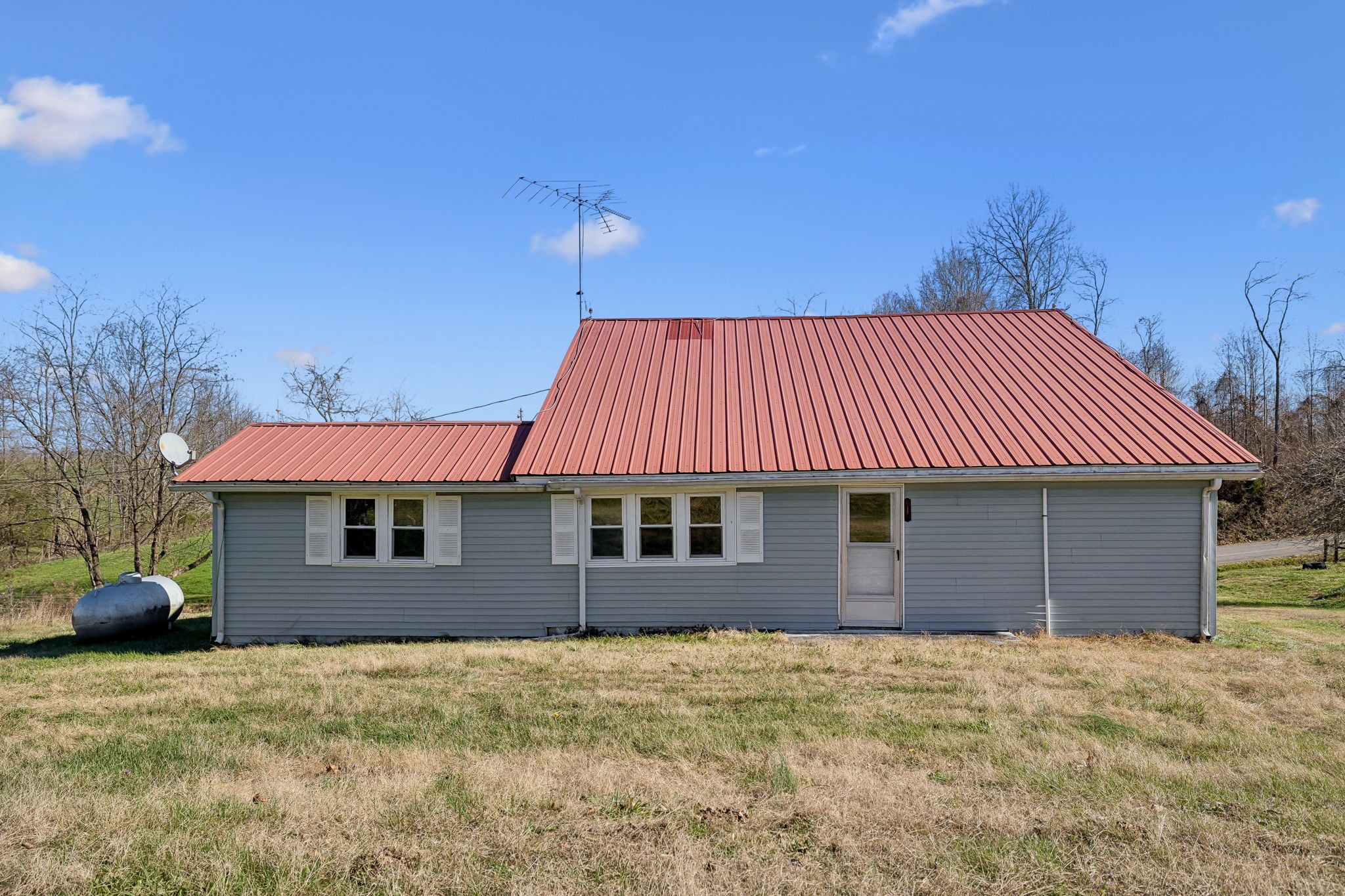 2554 Bakerton Road Red Boiling Springs, TN 37150 - Photo 44 of 46 a front view of a house with a yard