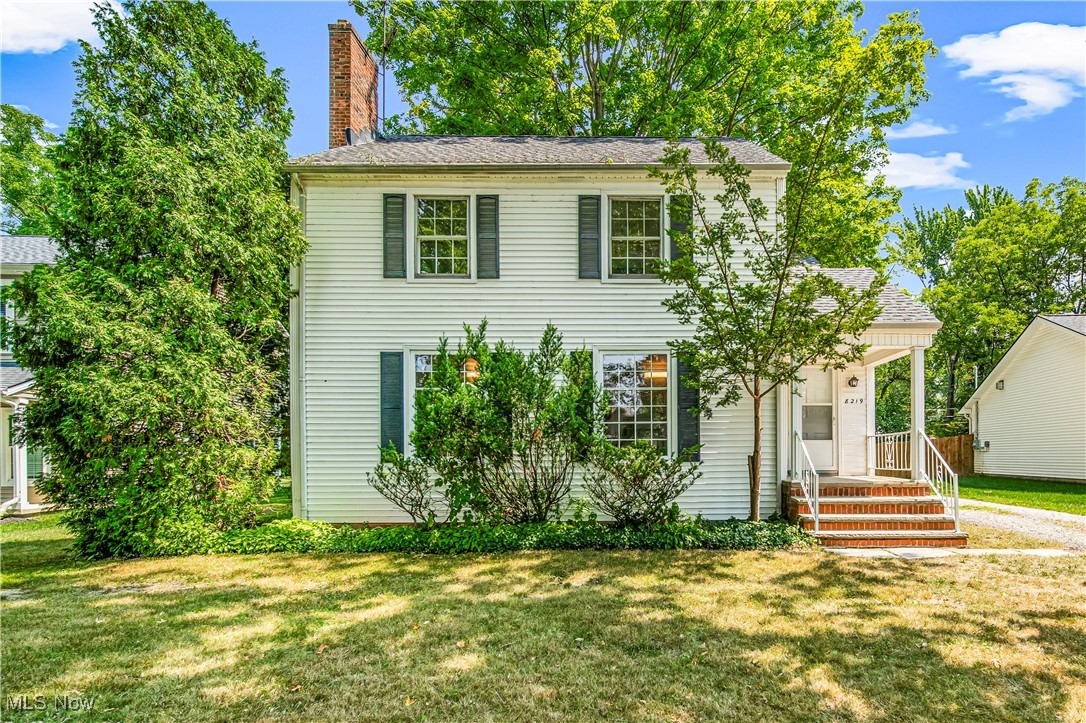 8219 Midland Road Mentor, OH 44060 - Photo 1 of 34 Colonial home featuring a front lawn