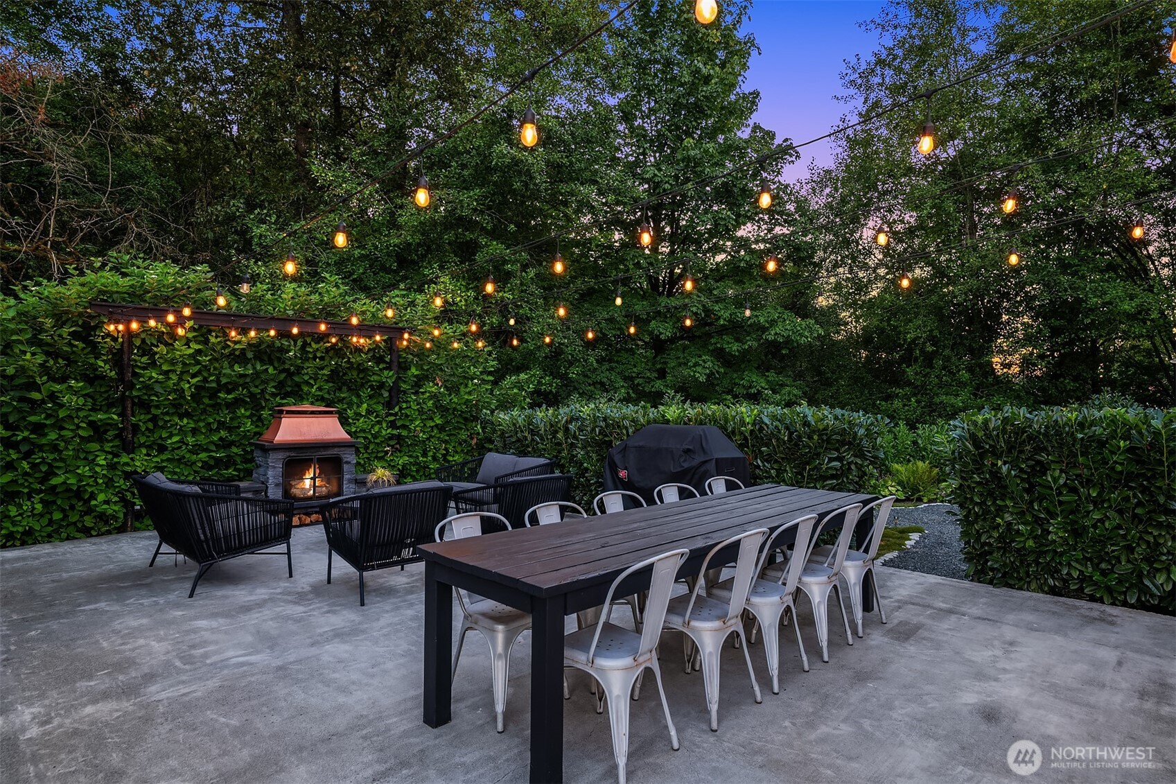 6514 East Lowell Larimer Road Snohomish, WA 98296 - Photo 24 of 40 a backyard of a house with table and chairs