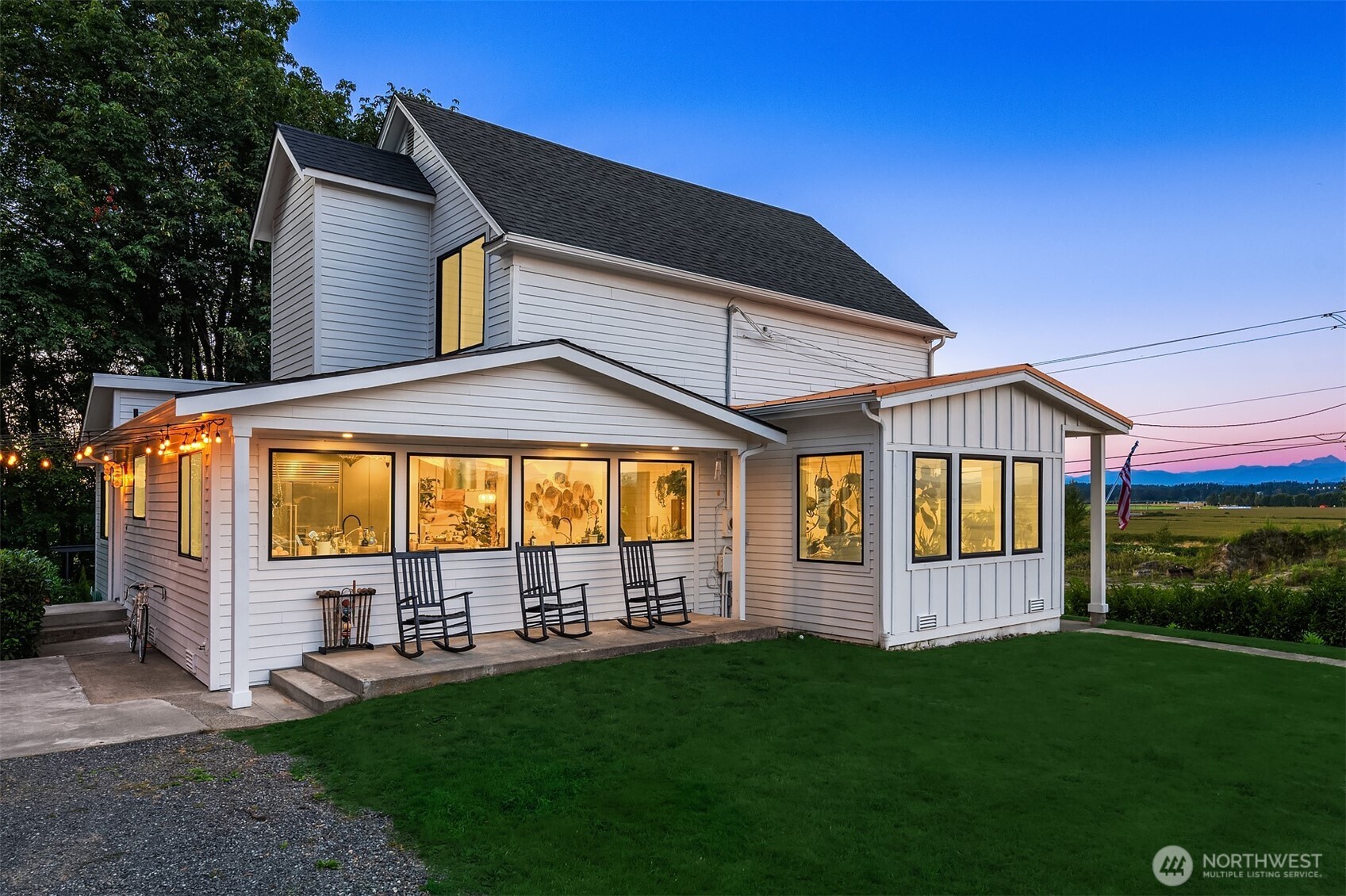 6514 East Lowell Larimer Road Snohomish, WA 98296 - Photo 30 of 40 a front view of house with yard and outdoor seating
