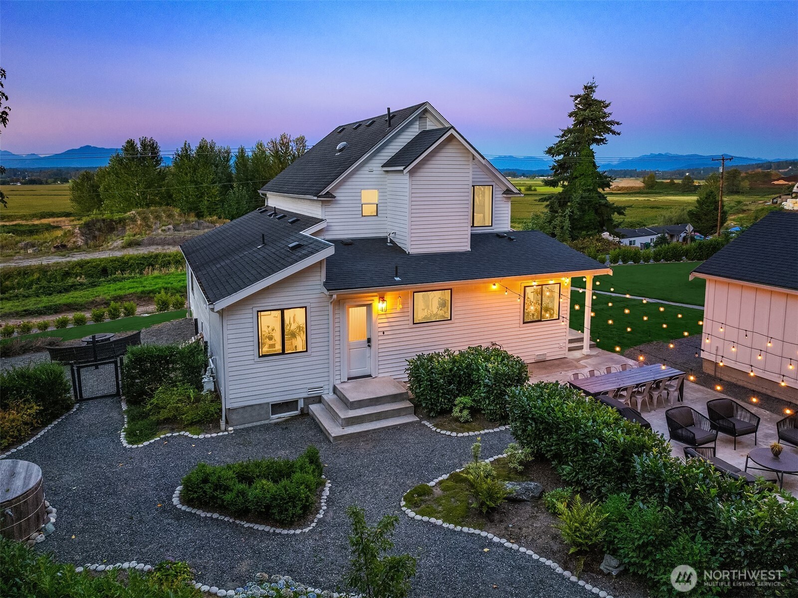 6514 East Lowell Larimer Road Snohomish, WA 98296 - Photo 35 of 40 a front view of a house with a yard