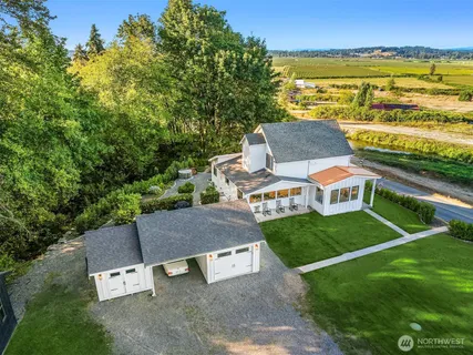 a view of a house with a big yard