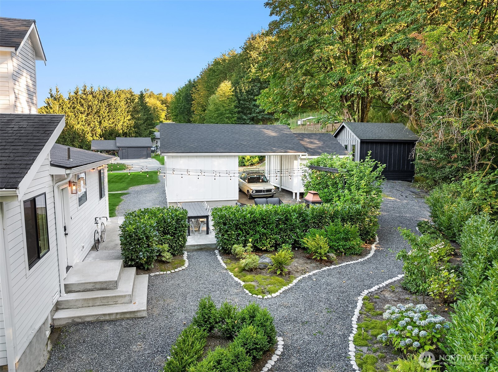 6514 East Lowell Larimer Road Snohomish, WA 98296 - Photo 40 of 40 a view of a house with a garden