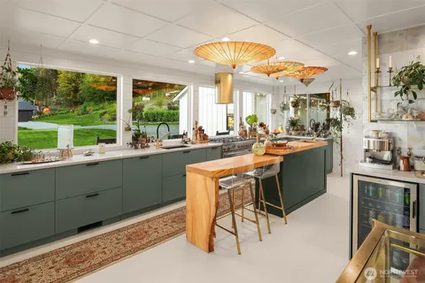 a kitchen with a sink and wooden cabinets