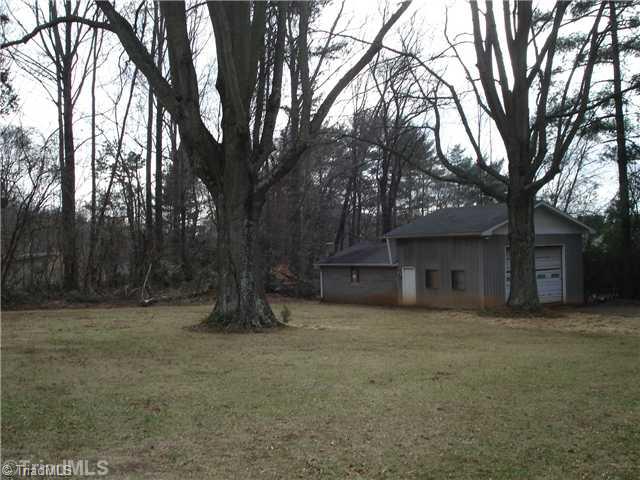110 Oak Summit Road Winston-Salem, NC 27105 - Photo 3 of 16 Yard/Garden. Level lot, large trees, wooded rear border