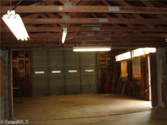 110 Oak Summit Road Winston-Salem, NC 27105 - Photo 5 of 16 Other. Concrete floor, electricity, tall ceiling to accommodate oversized vehicle